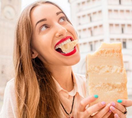 woman eating some cheese