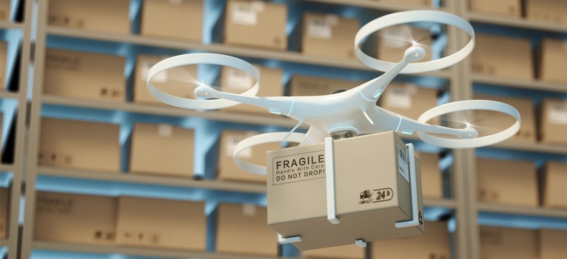 Drones carry express packages in warehouses.Packages are transported in high-tech Settings