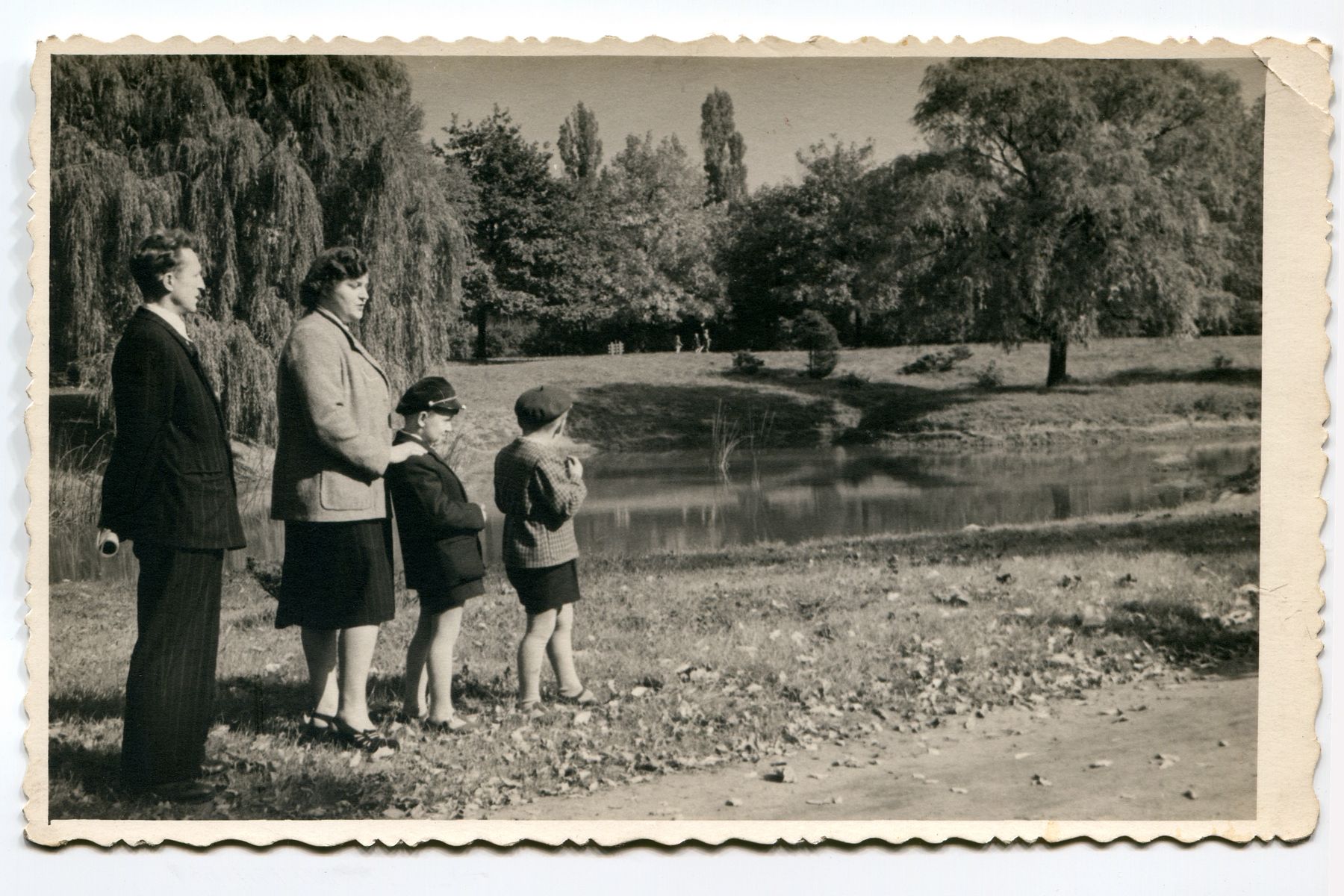 Parents with sons in park