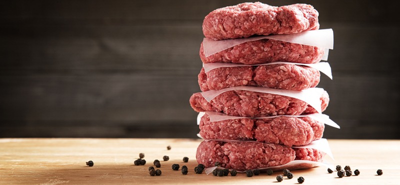 stack of raw hamburger meat