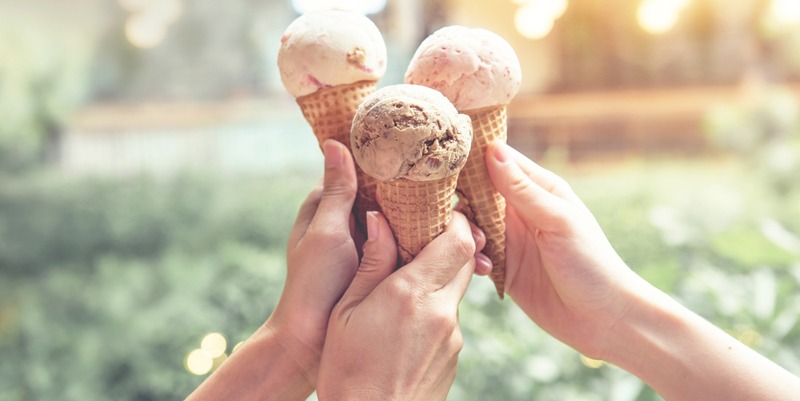 Hands holding ice cream