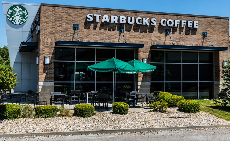 the view from ouStarbucks Shop Window Stock Photo - Download Image Nowtside an empty Starbucks coffee shop