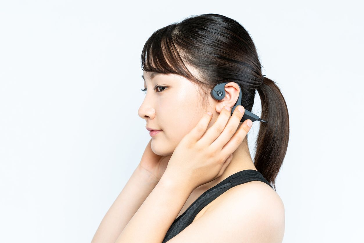 woman using bone conduction headphones
