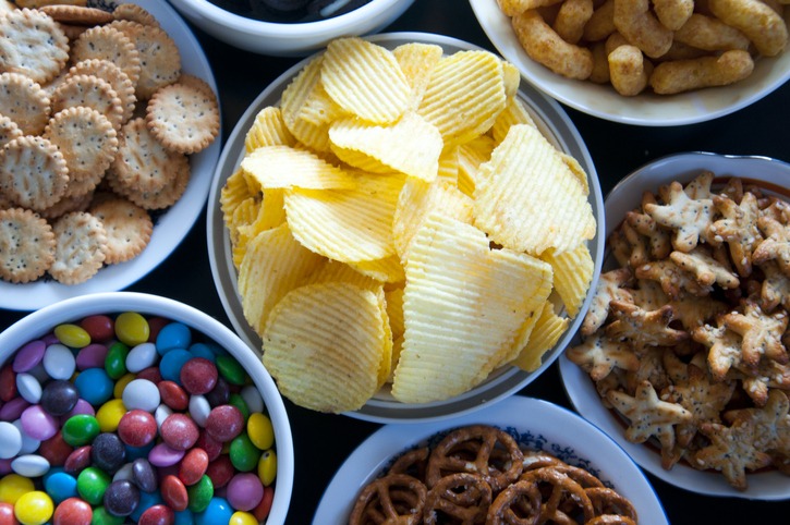 different snacks in bowls