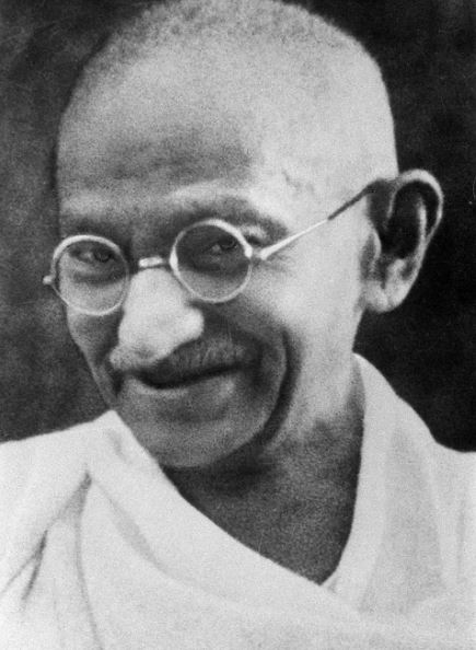 A black and white picture of Mahatma Gandhi