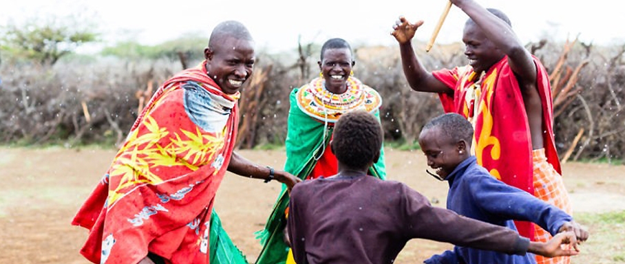 Maasai-family-celebrating-and-dancing