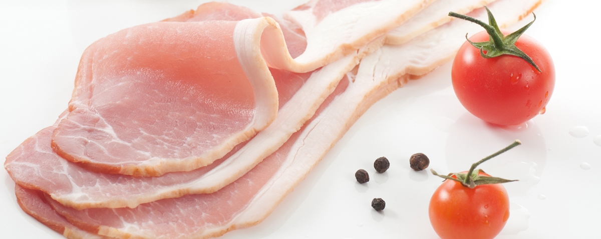 smoked raw back bacon on a plate