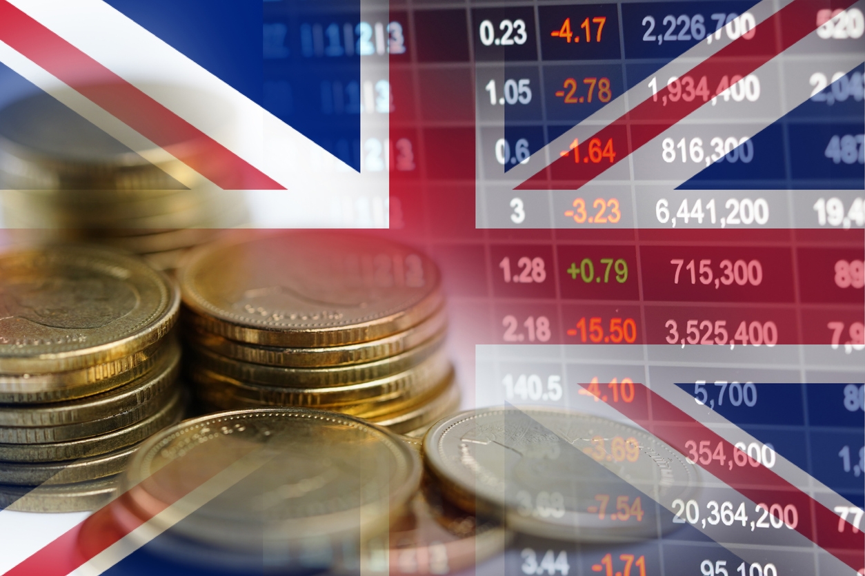 Stock market investment trading financial, coin and United Kingdom England flag or Forex