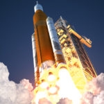 Space launch system taking off