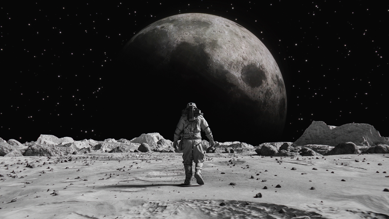 an astronaut walking towards the moon