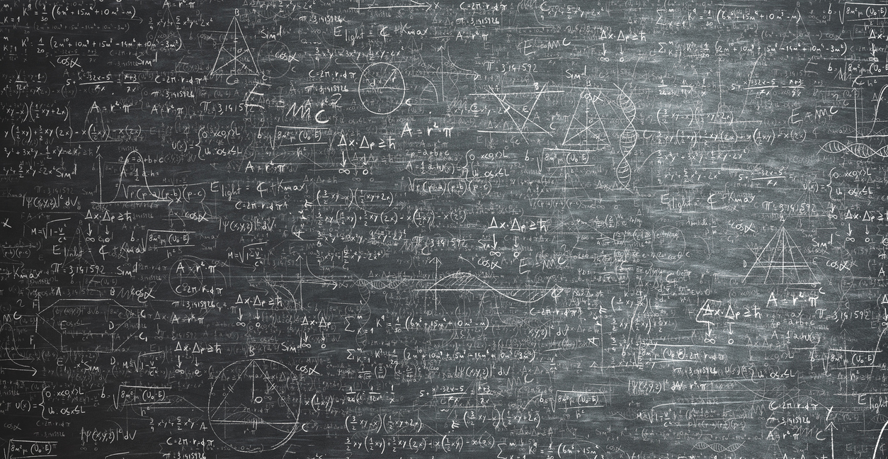 a board full of math equations