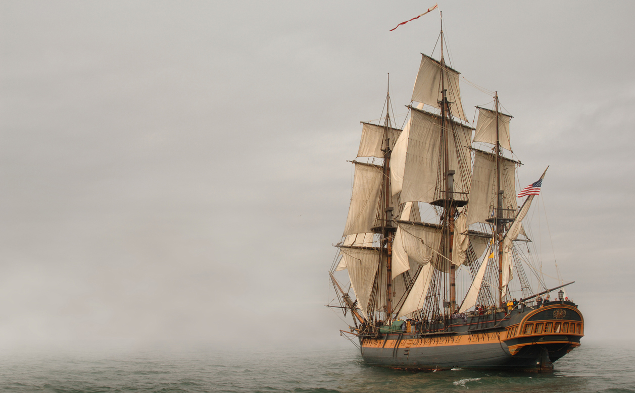 a clipper ship sailing on the ocean