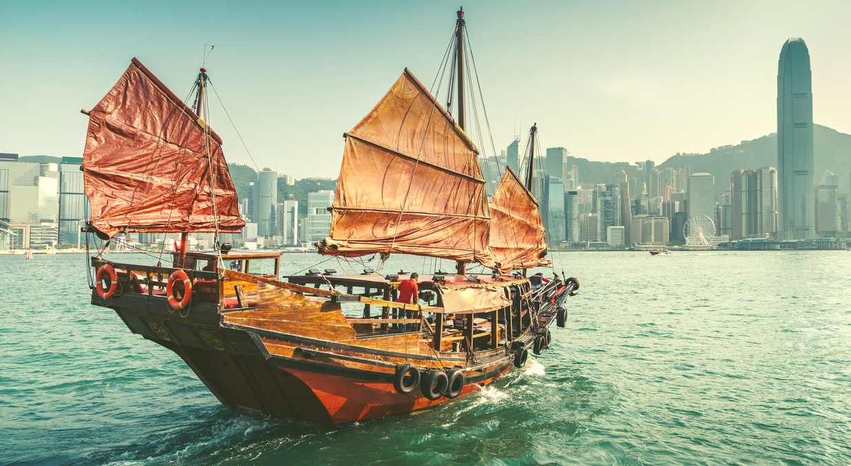 a junk boat sailing in Hong Kong