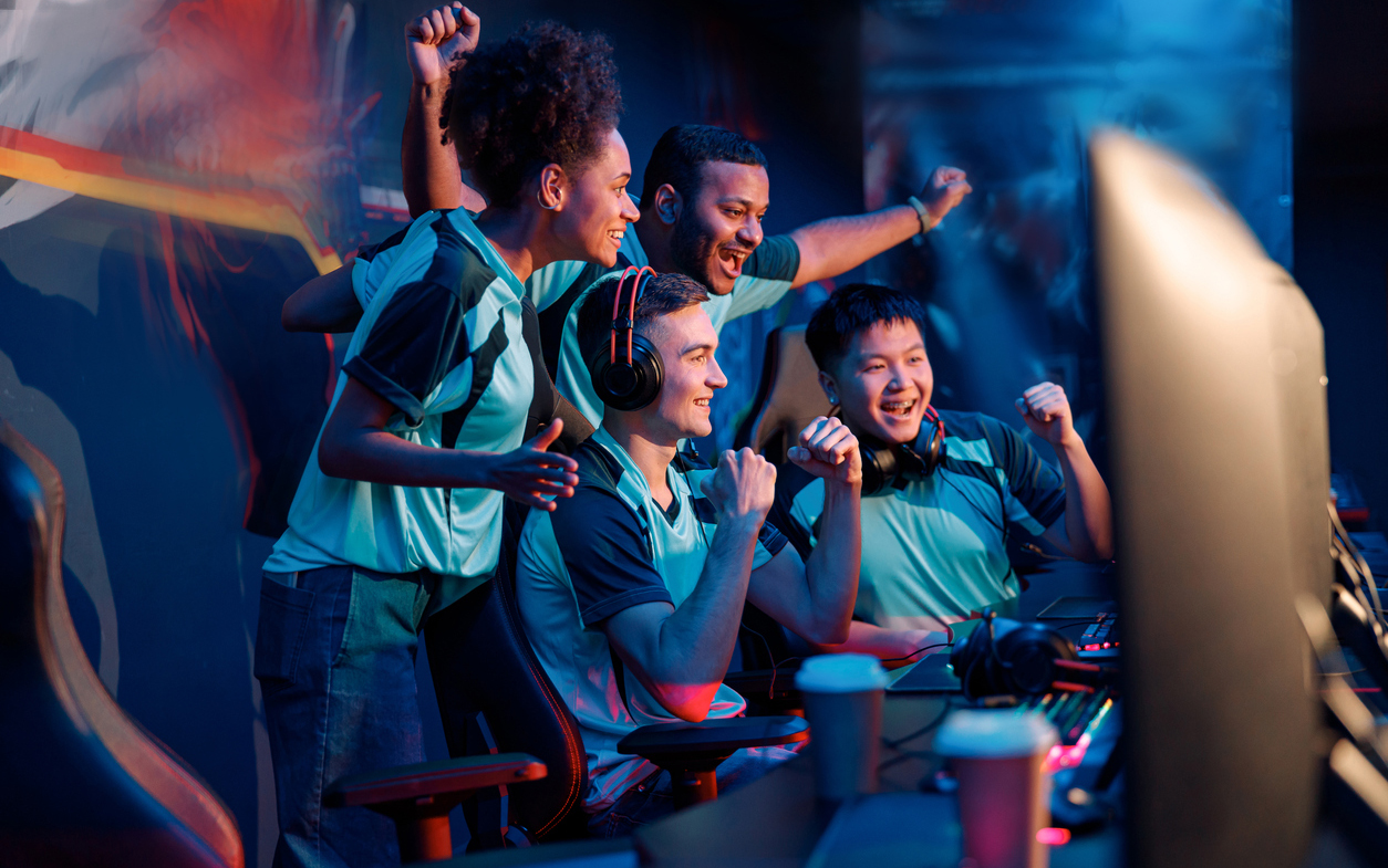 a team of eSports players celebrating their win
