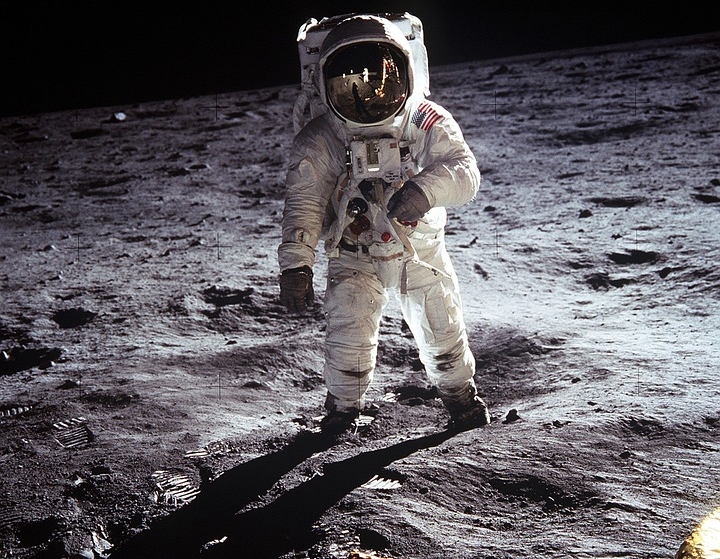 astronaut walking on the Moon