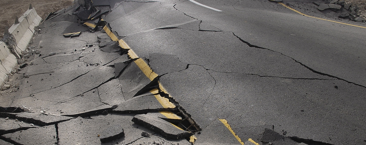 cracked asphalt after an earthquake