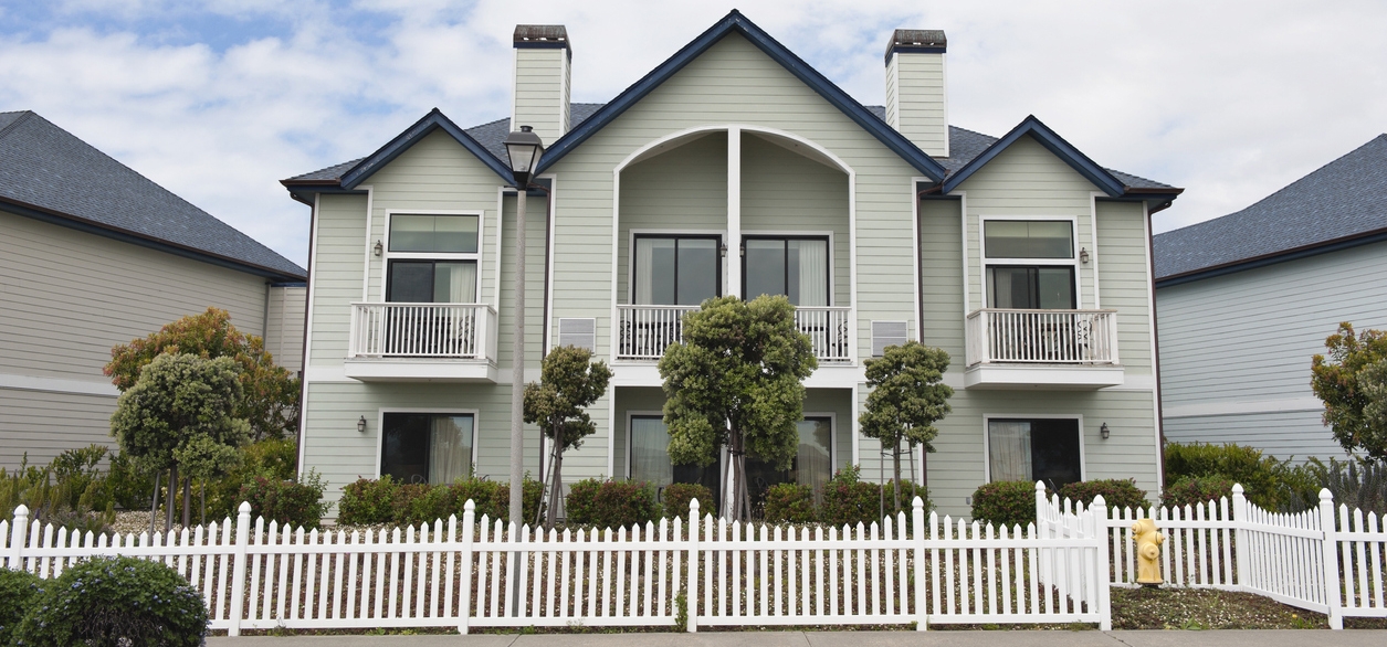 A house with a white picket fence