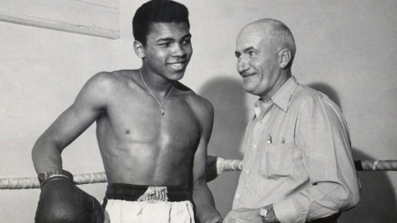 Cassius Clay and his trainer Joe E. Martin