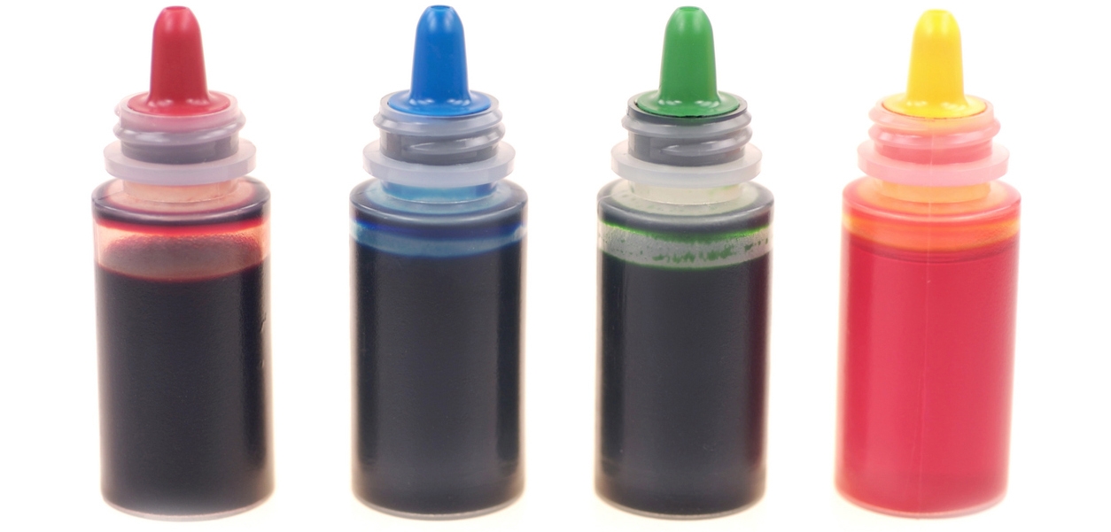 Liquid food coloring in bottles