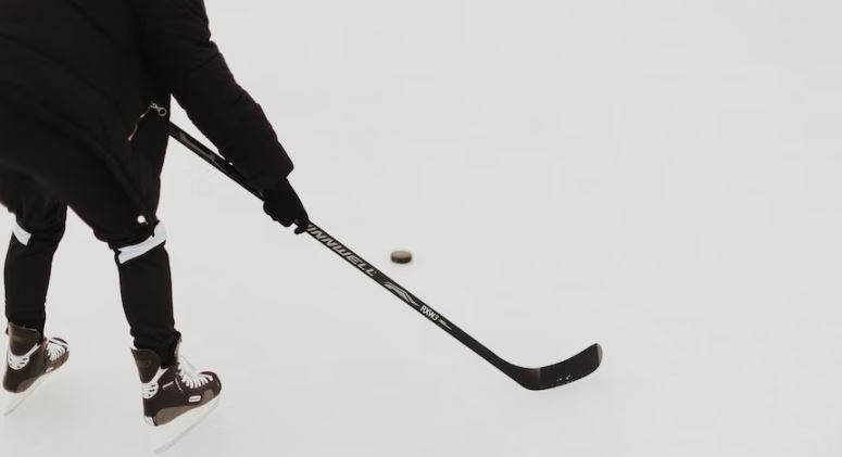 ice hockey stick and puck