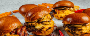 Delicious spicy burgers with cheese and jalapeno
