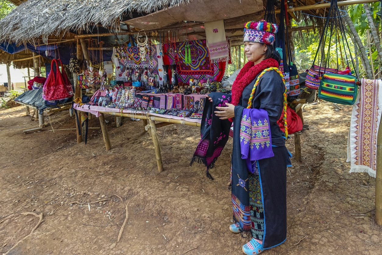 The woman of the Lahu tribe selling their craft