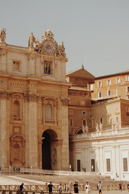 facade of st peter basilica with Oltramontano clock in Vatican City