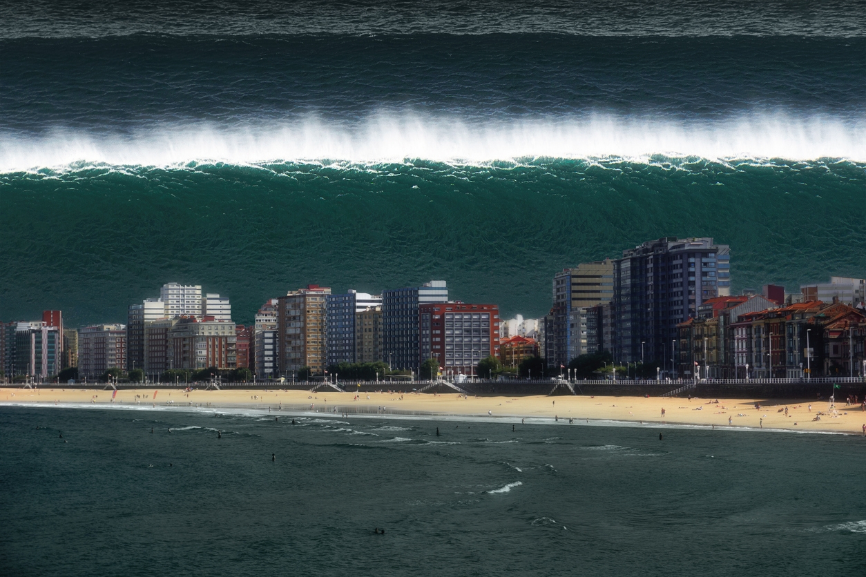 Big tsunami wave along city coast line