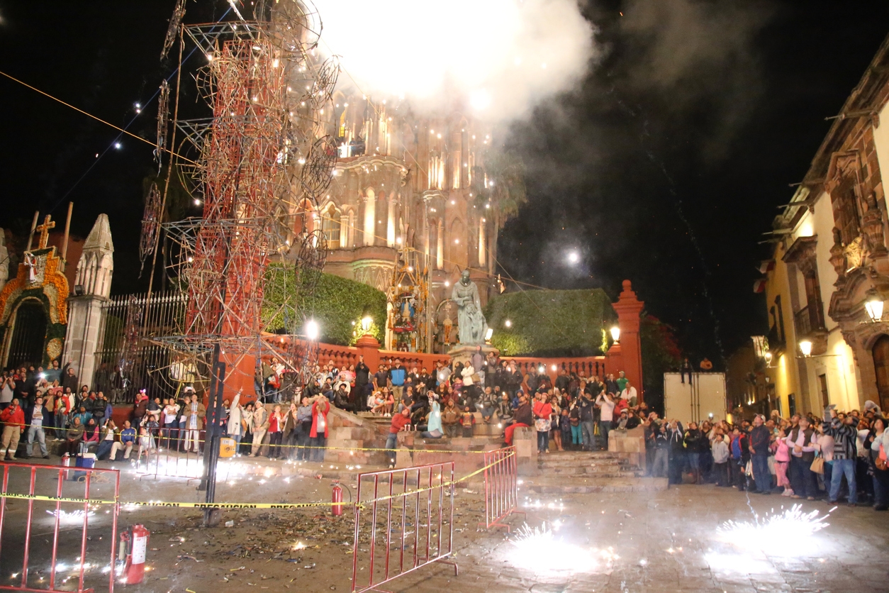 Fireworks and people gathered during Dia de los Muertos celebration