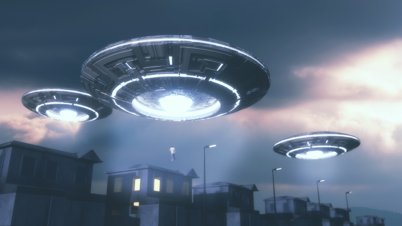 3d illustrated UFOs flying over a town